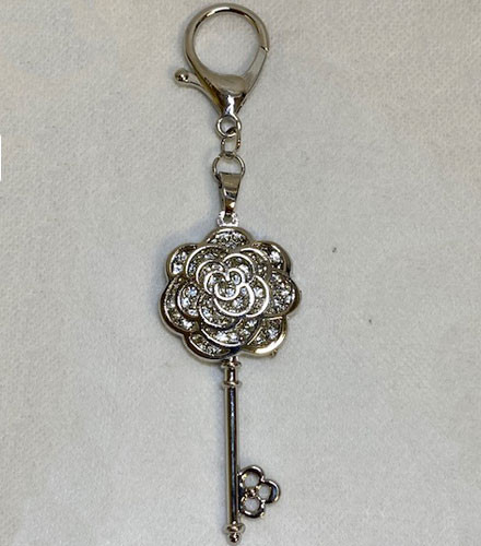 Porte-clé fleur strassée métal rose gold/argent